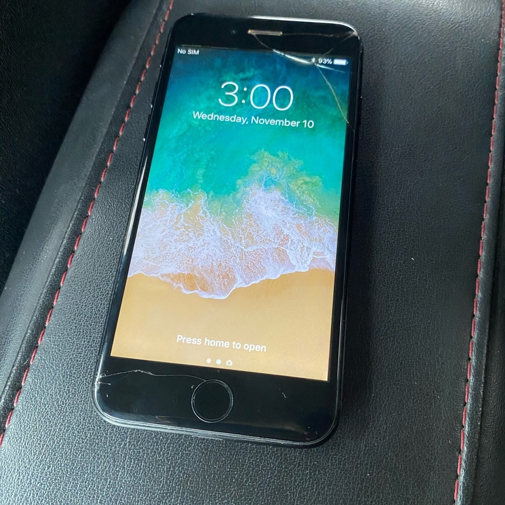 iphone 8 black, crack at top and bottom but phone works perfectly.